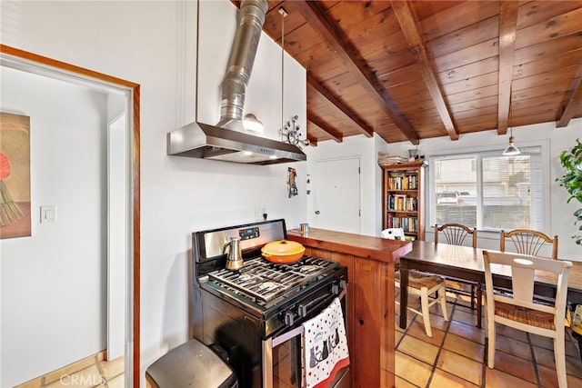 kitchen featuring stainless steel gas stove, white cabinetry, wood ceiling, lofted ceiling with beams, and pendant lighting