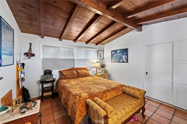 bedroom with wood ceiling, light tile patterned flooring, and lofted ceiling with beams