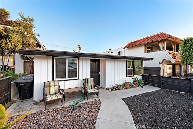 view of front of house with a patio area