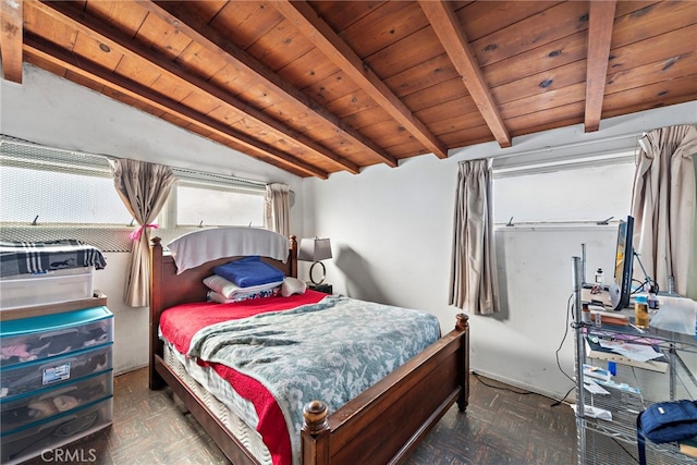 bedroom featuring vaulted ceiling with beams, wood ceiling, and dark parquet floors