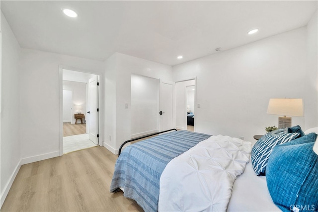 bedroom with light wood-type flooring