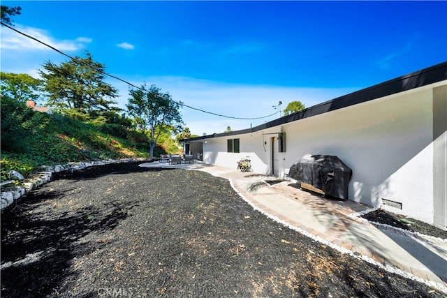 view of yard with a patio area