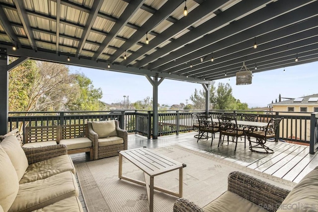 wooden terrace with outdoor lounge area