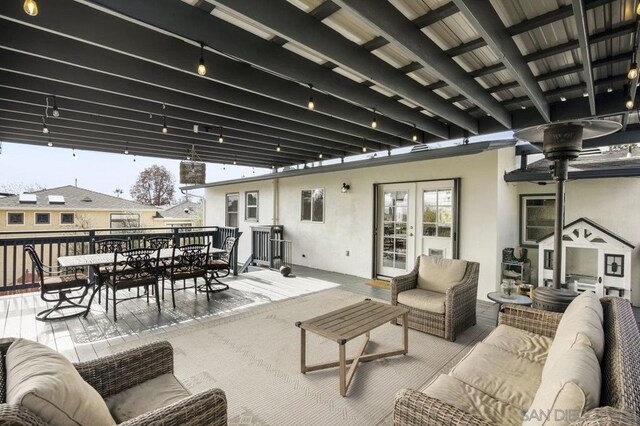 view of patio with an outdoor living space and french doors