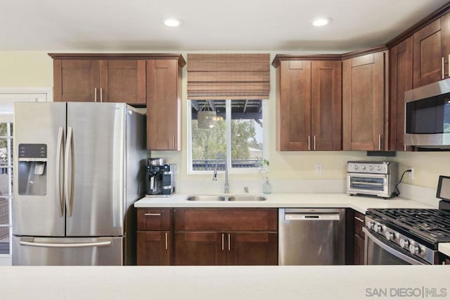 kitchen featuring stainless steel appliances and sink