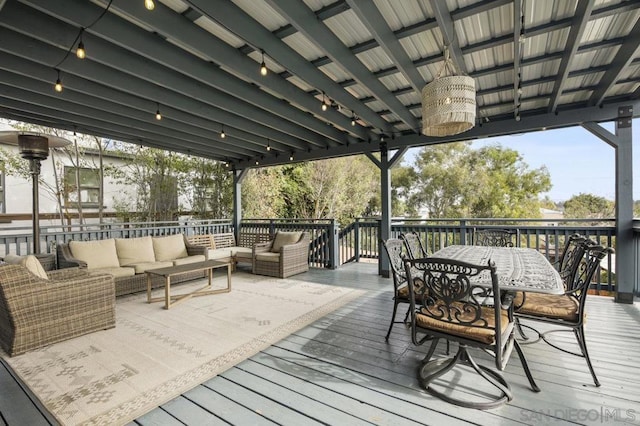 wooden deck featuring an outdoor hangout area