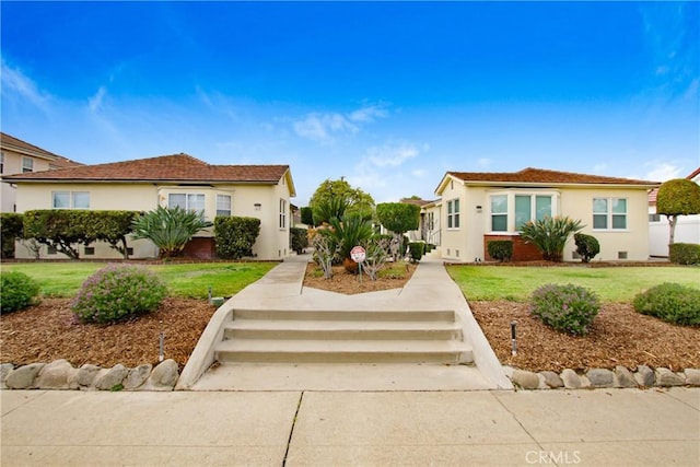 1605 S Atlantic Blvd, Alhambra, CA 91803 - view of front of property with a front yard and stucco siding