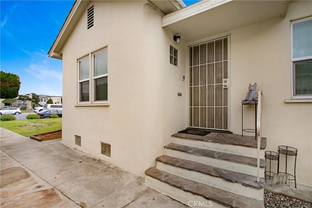 1605 S Atlantic Blvd, Alhambra, CA 91803 - view of exterior entry featuring stucco siding