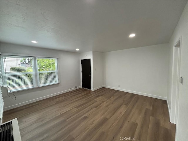 1605 S Atlantic Blvd, Alhambra, CA 91803 - unfurnished room with wood finished floors, baseboards, and recessed lighting