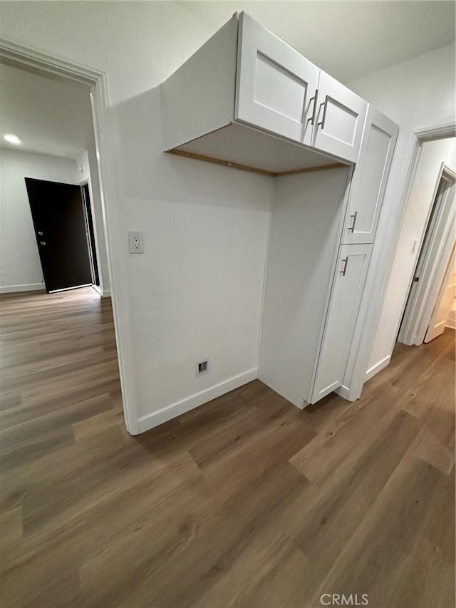 1605 S Atlantic Blvd, Alhambra, CA 91803 - kitchen featuring dark wood-type flooring, white cabinets, and baseboards