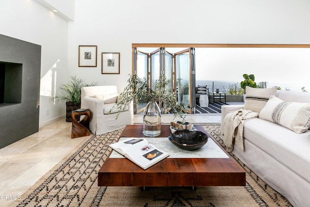 8326 Grand View Dr, Los Angeles, CA 90046 - living area featuring baseboards