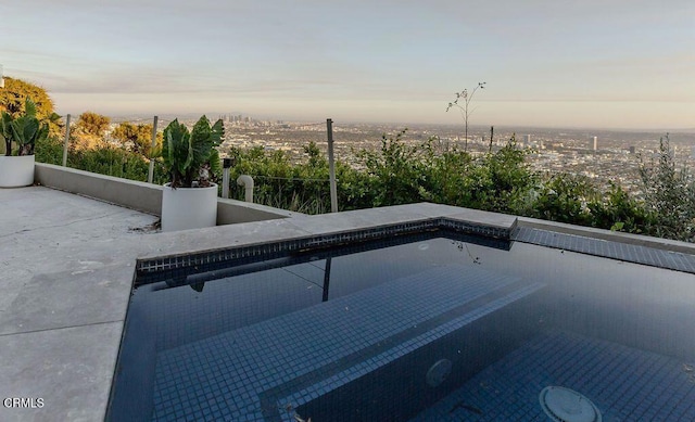 8326 Grand View Dr, Los Angeles, CA 90046 - swimming pool with a patio area