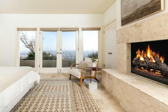 8326 Grand View Dr, Los Angeles, CA 90046 - bedroom with access to exterior, french doors, and a high end fireplace