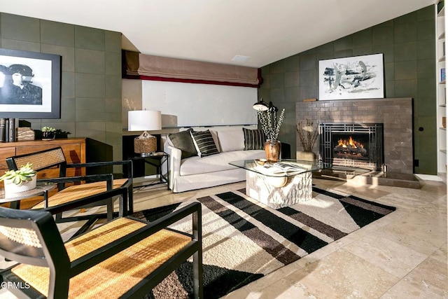 8326 Grand View Dr, Los Angeles, CA 90046 - living room with vaulted ceiling, a brick fireplace, and tile walls