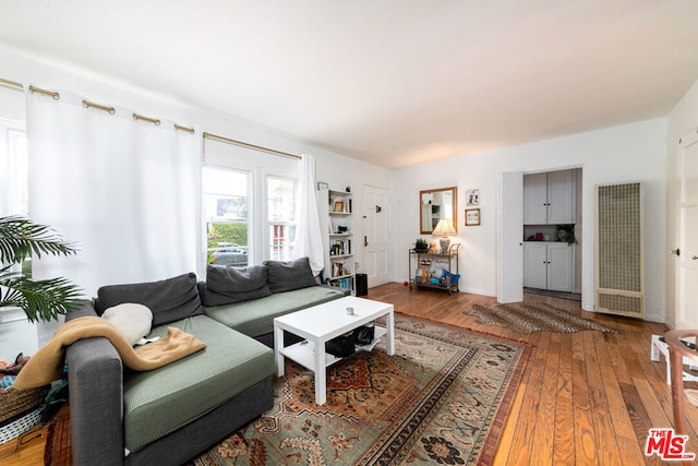 living room with hardwood / wood-style flooring