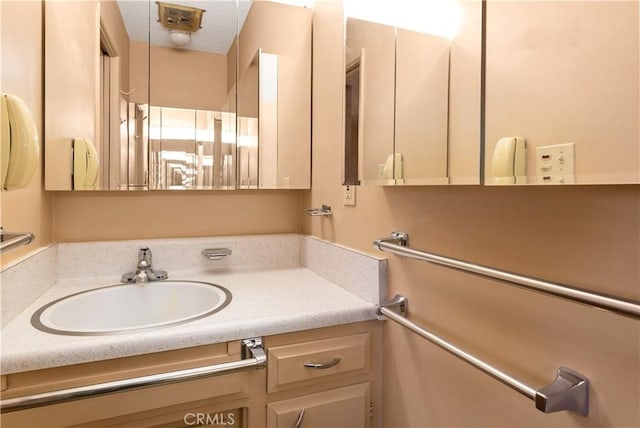 332 E 7th St, San Jacinto, CA 92583 - bathroom with vanity and a textured ceiling