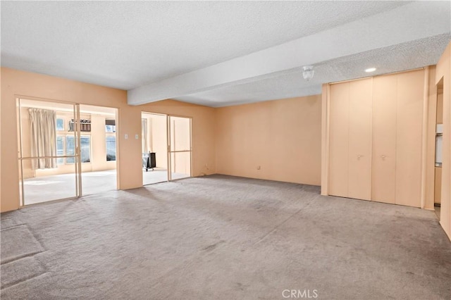 332 E 7th St, San Jacinto, CA 92583 - spare room with light carpet and a textured ceiling