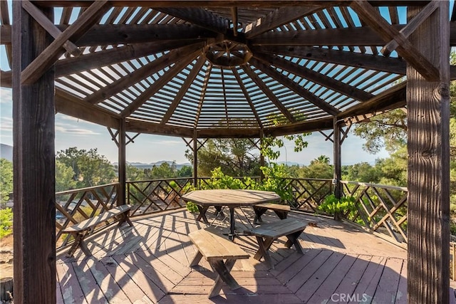 wooden deck featuring a gazebo