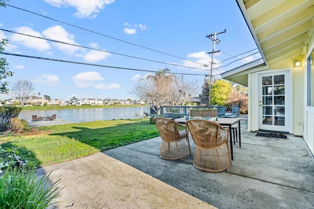 view of patio featuring a water view