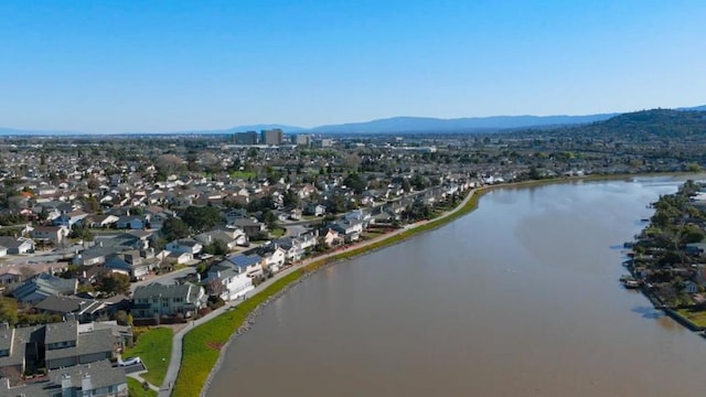 aerial view with a water and mountain view