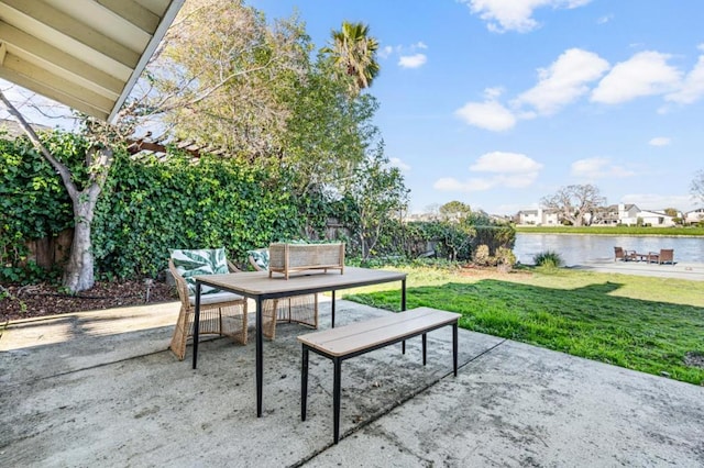 view of patio / terrace with a water view