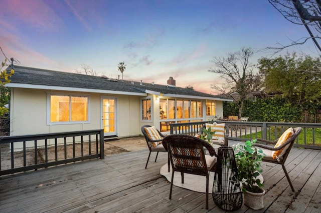 view of deck at dusk