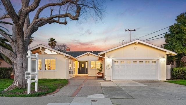 ranch-style home with a garage