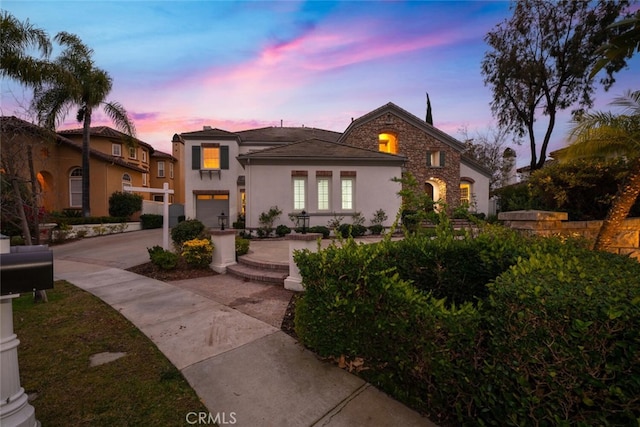 view of front of property with a garage