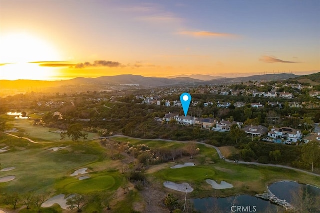 aerial view at dusk with a mountain view