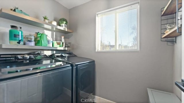 laundry room featuring washing machine and dryer