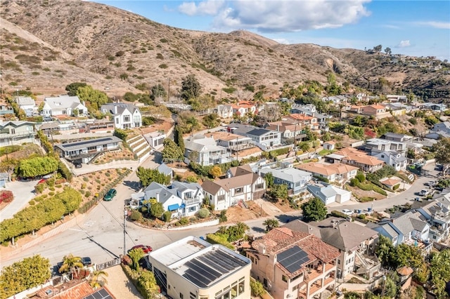 drone / aerial view featuring a mountain view