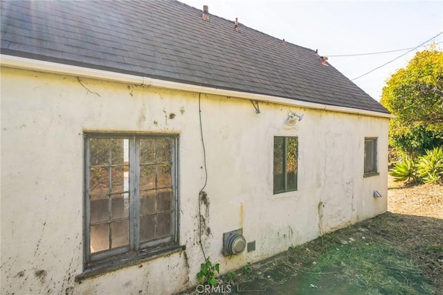 view of home's exterior with french doors