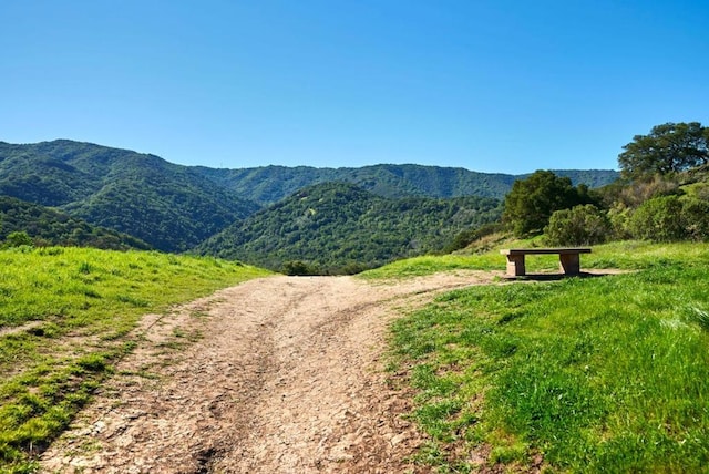 view of mountain feature with a rural view