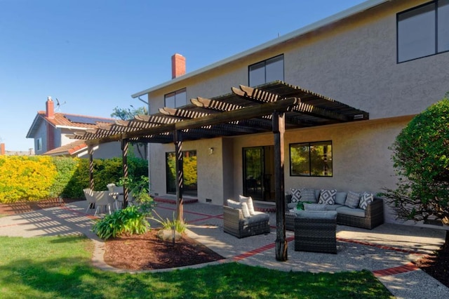 rear view of house with a pergola, an outdoor hangout area, and a patio