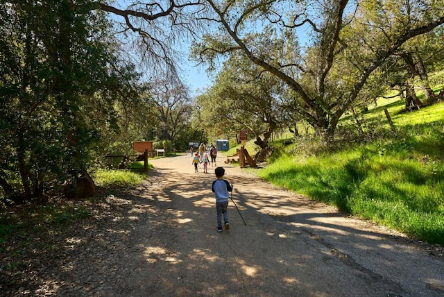 view of property's community featuring a playground