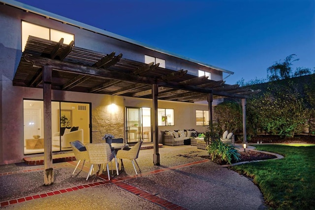 view of patio / terrace featuring a pergola and an outdoor hangout area