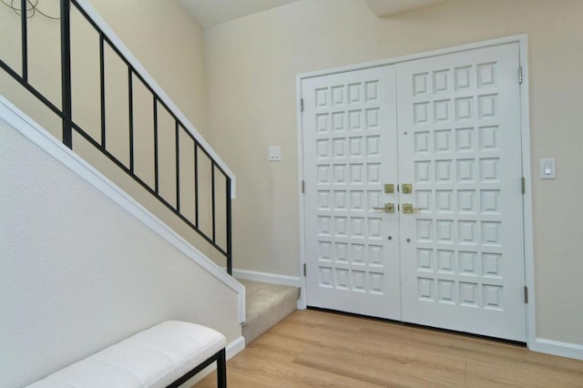 entryway with light wood-type flooring