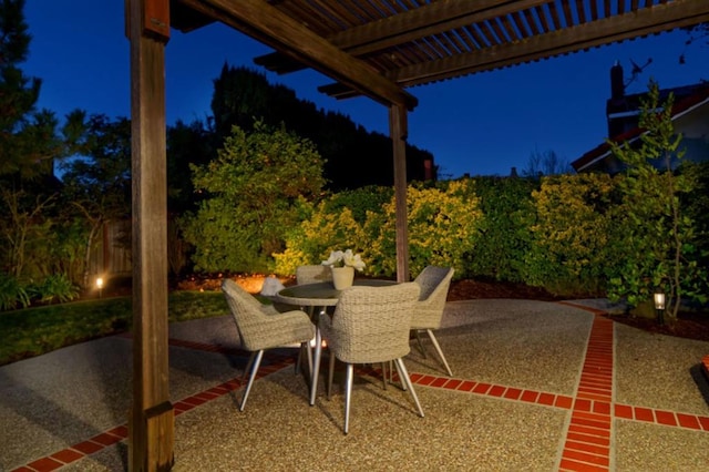 patio at twilight with a pergola