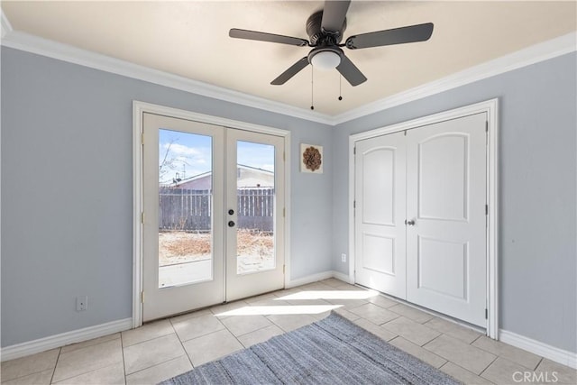 doorway to outside featuring light tile patterned floors, crown molding, and french doors