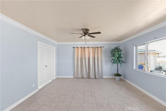 unfurnished room with crown molding, ceiling fan, and light tile patterned floors