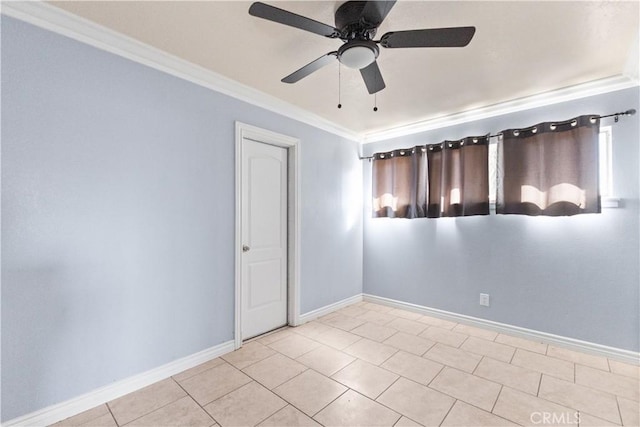 unfurnished room with crown molding, ceiling fan, and light tile patterned flooring