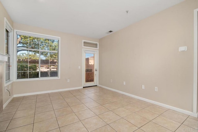 view of tiled spare room