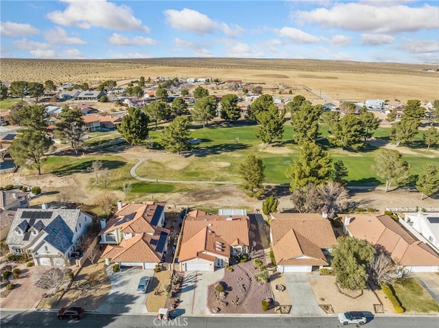 aerial view with view of golf course and a residential view