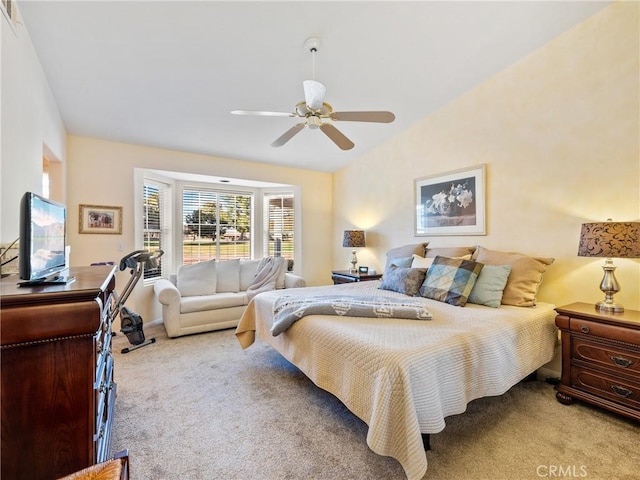 bedroom featuring light carpet, visible vents, a ceiling fan, and lofted ceiling