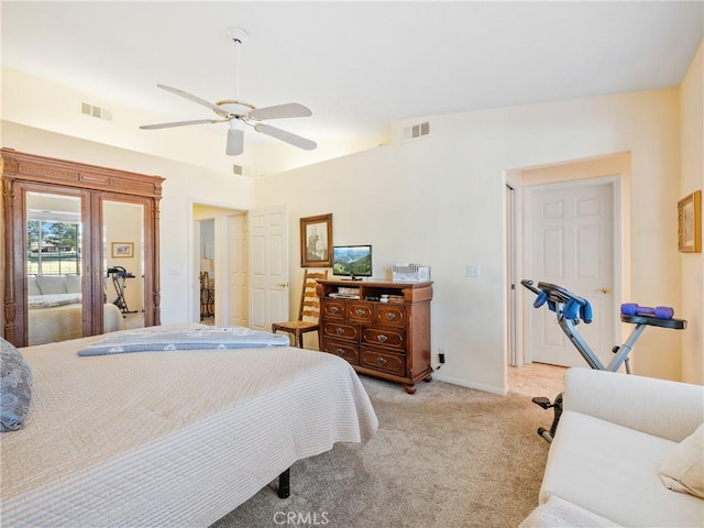 bedroom featuring visible vents, ceiling fan, light carpet, and baseboards