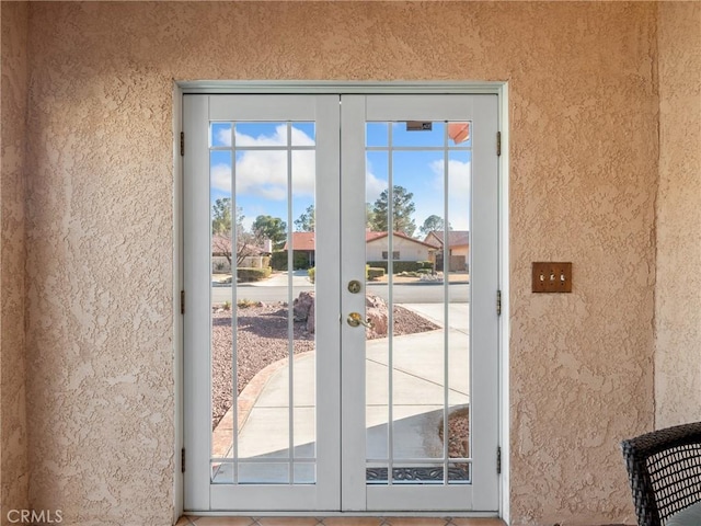 doorway to outside with french doors