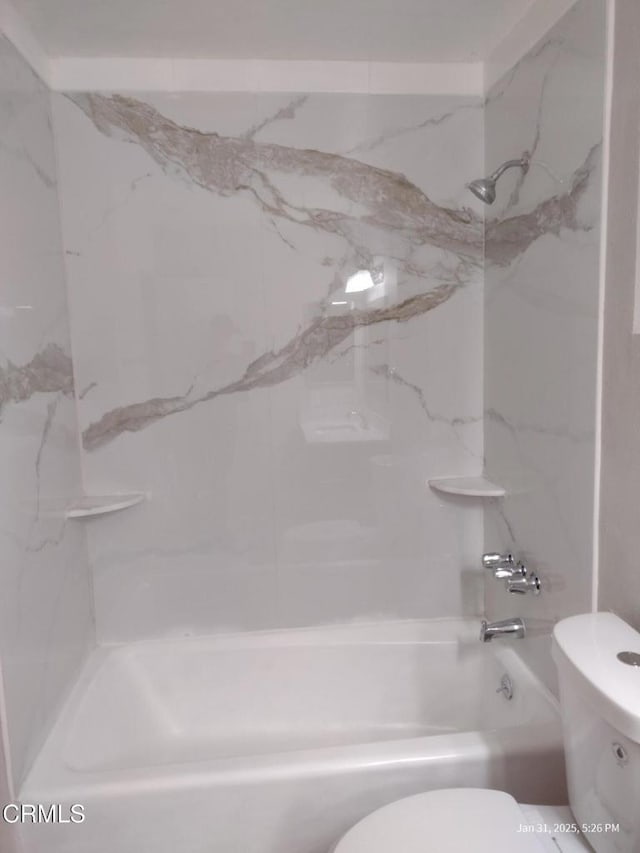 full bath with shower / bath combination and toilet