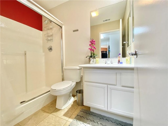 81060 Paloma Cir, Indio, CA 92201 - bathroom featuring tile patterned flooring, a stall shower, toilet, and vanity