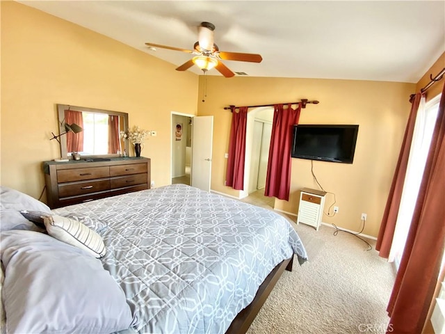 81060 Paloma Cir, Indio, CA 92201 - bedroom featuring carpet, multiple windows, vaulted ceiling, ceiling fan, and baseboards