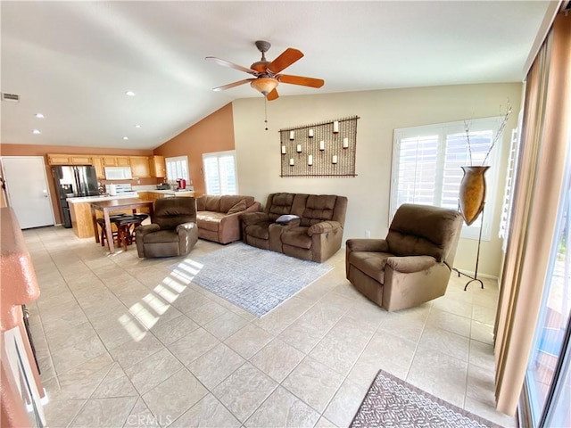 81060 Paloma Cir, Indio, CA 92201 - living room featuring vaulted ceiling, a ceiling fan, light tile patterned floors, and recessed lighting